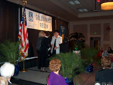 Debbie Murphy reciving the Laurel Society plaque - Spring Conference 2005